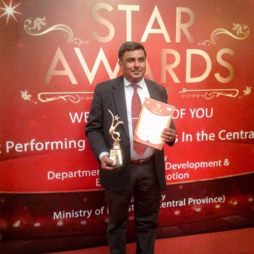 Person holding award and certificate.Our Achievements for the hard work. Vanilla Lanka Pvt Ltd